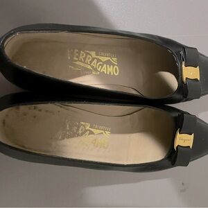Salvatore Ferragamo Black Flats with Gold Hardware